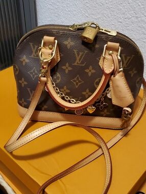 Louis Vuitton Monogram Alma BB Handbag in Brown and Natural Vachetta